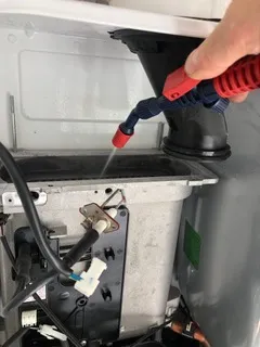 Boiler condensate trap and internal components during servicing inspection