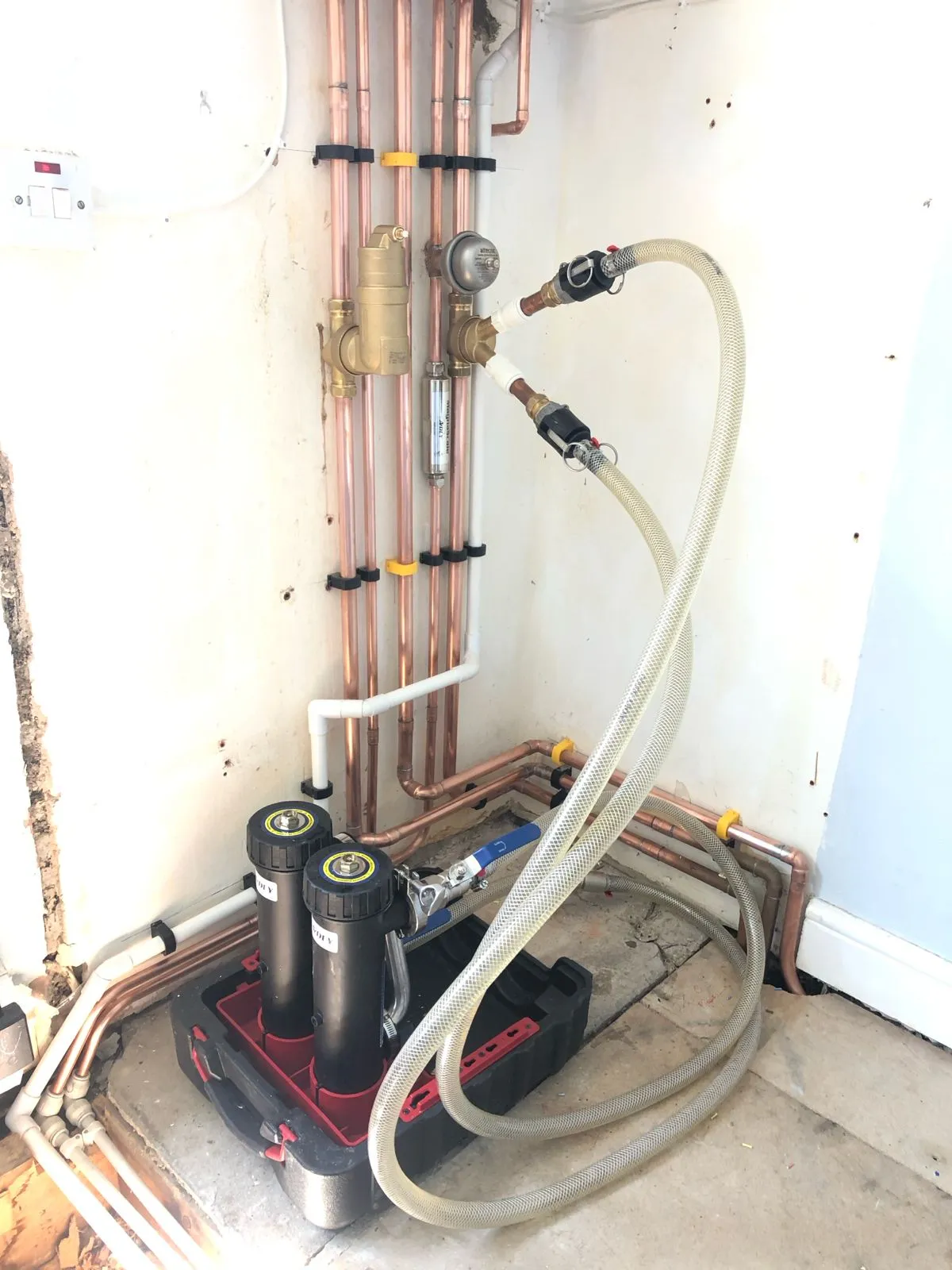 Power flushing a central heating system using twin filters and precision pipework – AC Plumbers Brighton