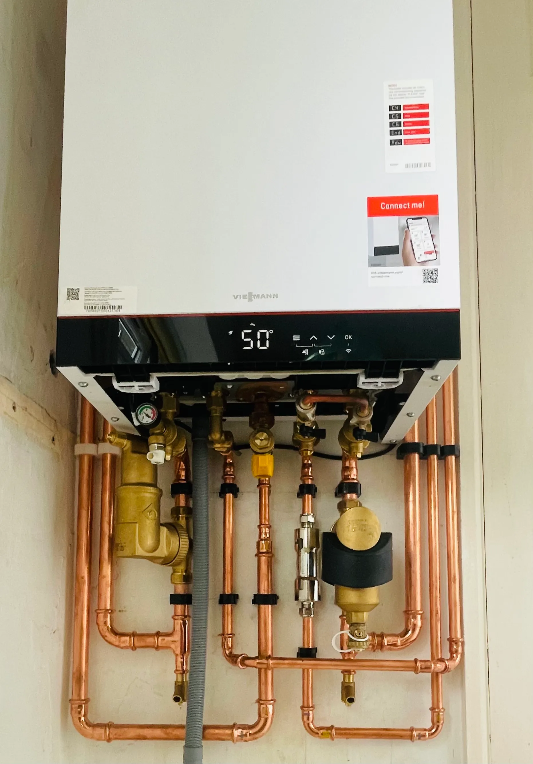 Viessmann gas boiler installation with copper pipework and smart controls, fitted by AC Plumbers Ltd.